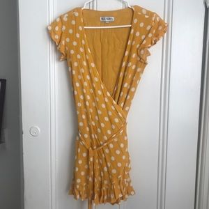 Yellow polka dot wrap dress
